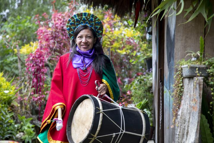 A woman from the Kämentsá Biyá community in Colombia dressed with the traditional customs of the Bëtscnaté celebrations.
