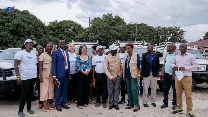 Joseph Nduwumwami stands with his staff from the HNTPO Bujumbura office.